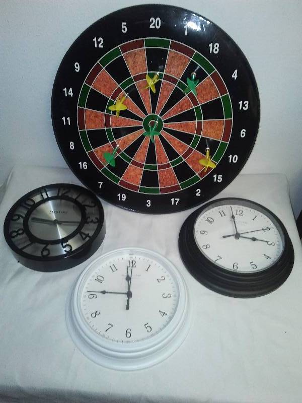 lot 92 image: Magnetic Regulation size dart board and clocks (3)