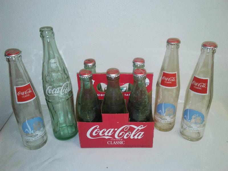 lot 122 image: Vintage Coca Cola Bottle Collection, Plattsburg NY, Detroit, Springfield, Louisville, Orlando