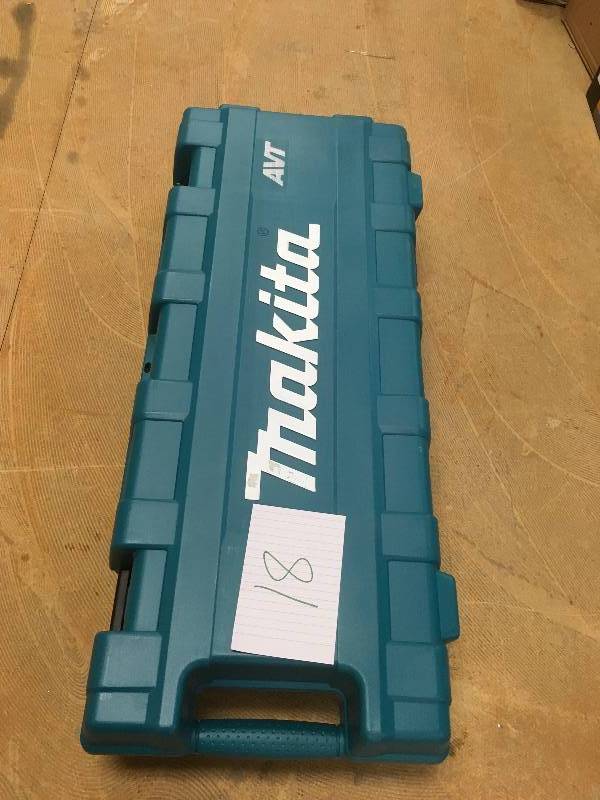 Makita 14 Amp 27 lb. AVT Demolition Hammer with Case Model # HM1214C not used open box retails for $820