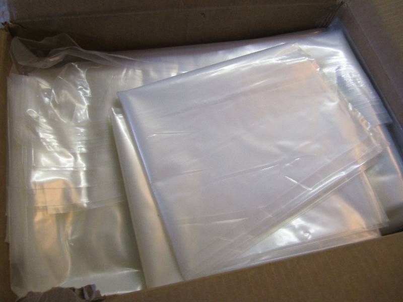 lot 83 image: Box of 100 Clear Plastic Bags 28 x...