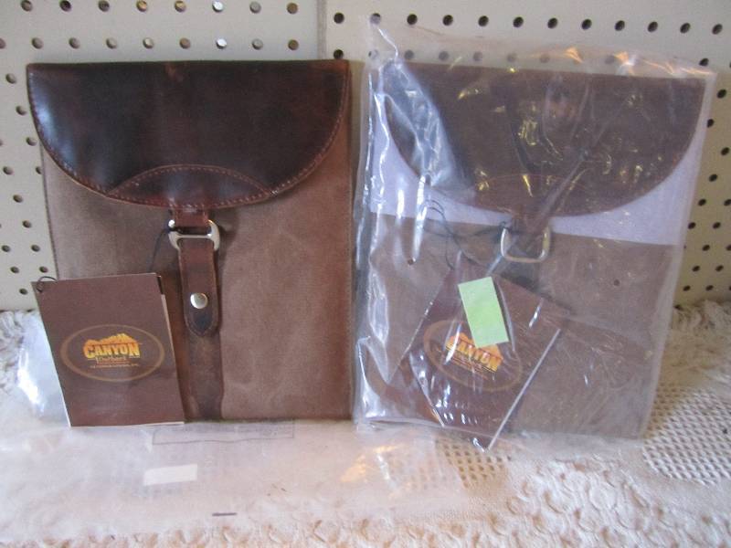 lot 152 image: Lot of 2 Canyon Outback Leather Box...