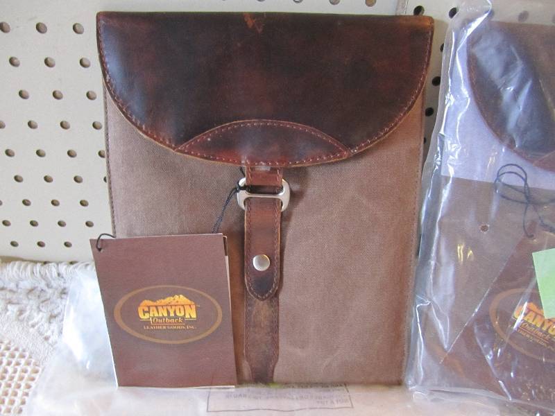 lot 153 image: Lot of 2 Canyon Outback Leather Box...