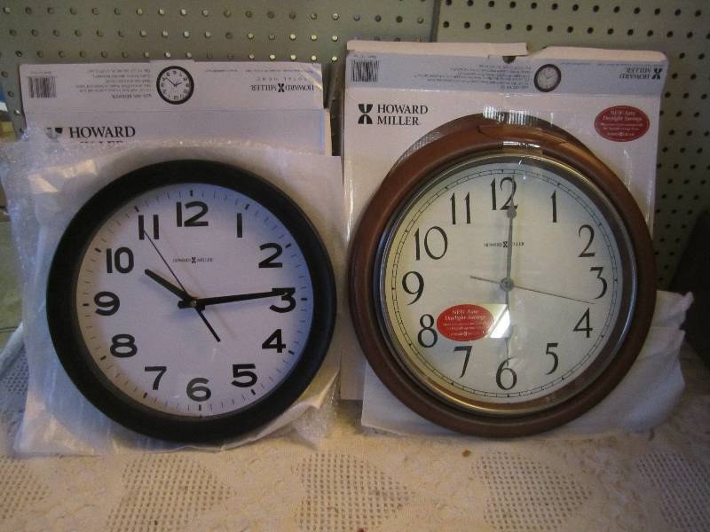 lot 295 image: Lot of 2 Howard Miller Wall Clocks ...