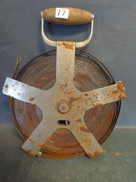 lot 17 image: Vintage Steel Fish Tape
