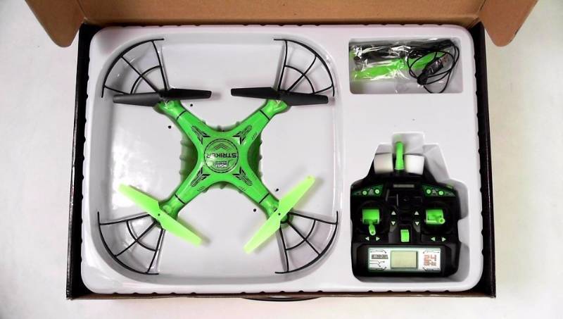 lot 2210 image: Striker Spy Drone Glow in the Dark w Camera 2.4 GHZ 4.5 Channel Quadcopter