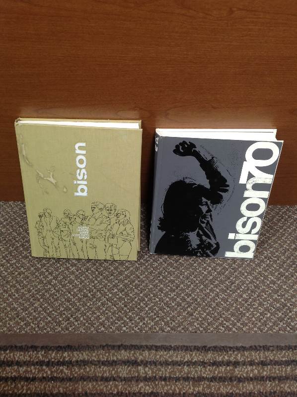 lot 6 image: NDSU Alumni Books, and U of M Posters, and Escort Rader Detector Sony Mega Watchmen TVRadio