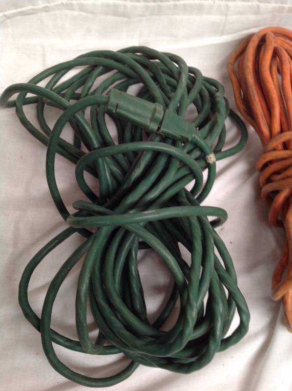 lot 9 image: Two Extension Cords, Green And Orange