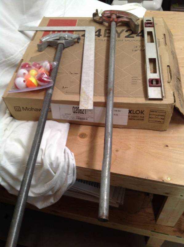 lot 17 image: Mohawk Carpet, 2 foot Level, Bobbers, Square and 2 Pipe Benders