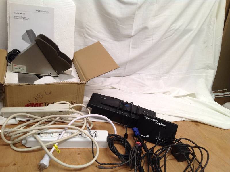 lot 18 image: Check Jogger, Two Power Strips,  Shredder,  Misc Cords,  Video Game Jockey,