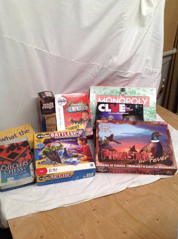 lot 31 image: Board Games- Jenga, Battle Ship, Pheasant, Clue and Monopoly