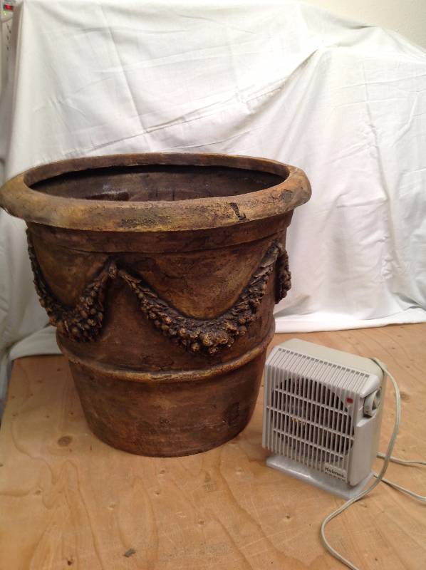 lot 95 image: Flower Pot and Personal Heater