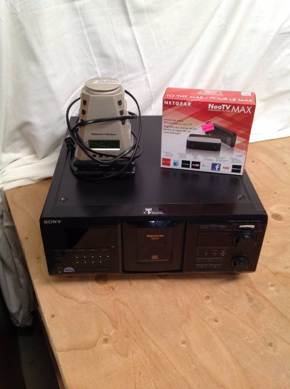 lot 103 image: Sony- 400 CD Changer, Net Gear Neo TV, Alarm Clock
