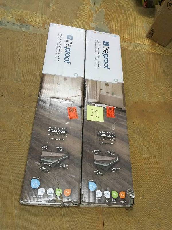 lot 106 image: LifeProof Multi-Width x 47.6 in. Seasoned Wood Luxury Vinyl plank Flooring (19.53 sq. ft.case) Lot of 2 - Open Box