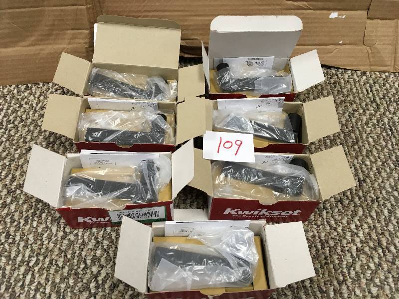 Kwikset door locks. ot of 7 open box