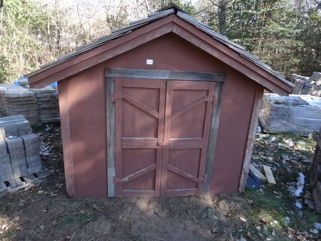 lot 23 image: Wood outdoor shed. 76 x 86 x 72. No...