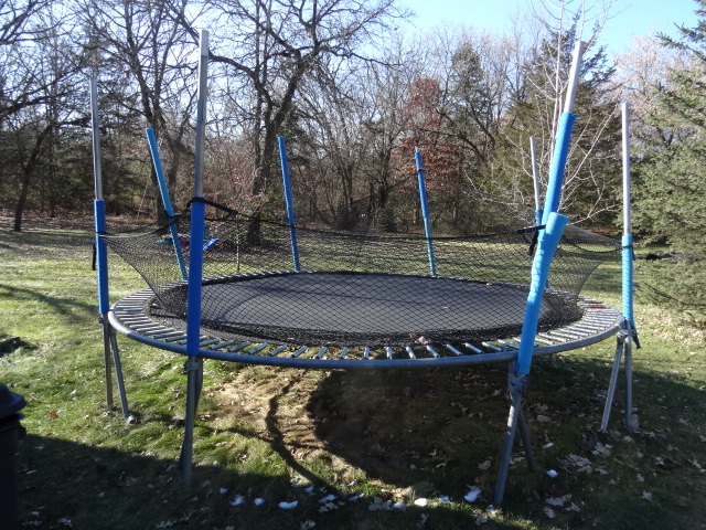 lot 30 image: Trampoline with side netting. 14. ...