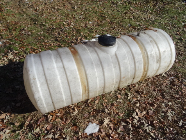 lot 38 image: 100 gal poly tank...