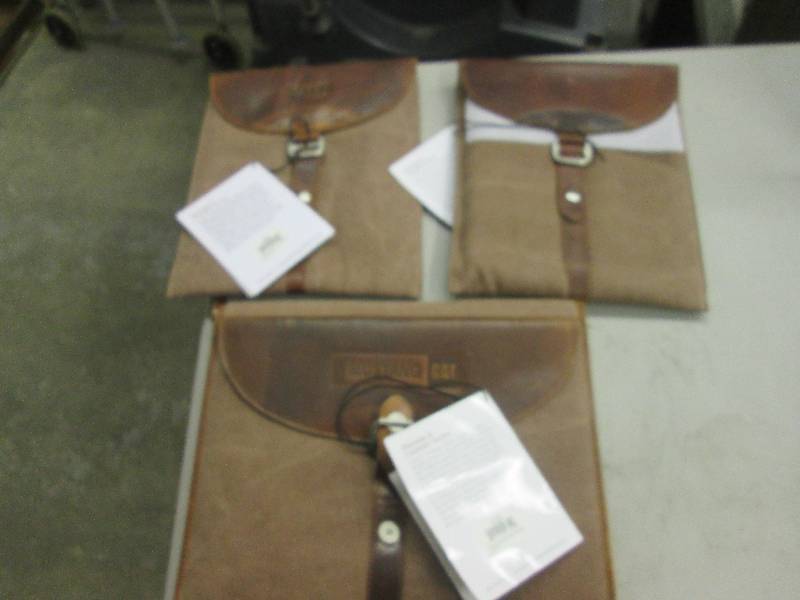 lot 58 image: 2 - I pad case pull up leather wash...
