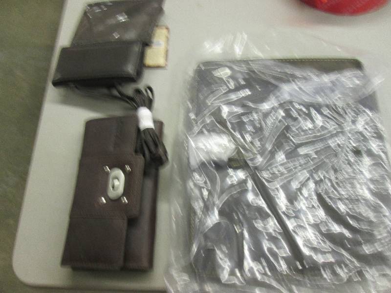 lot 77 image: 1 caynon outback leather wallet , 1...