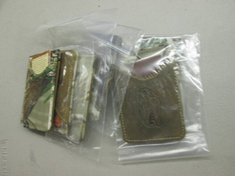 lot 83 image: 7  new leather canyon money clips ...