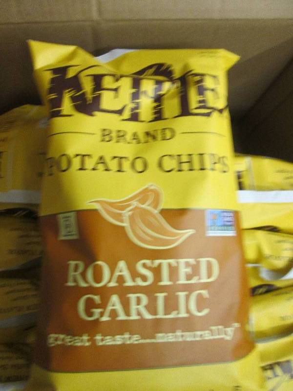 lot 99 image: 12-8.5oz bags of kettle roasted gar...
