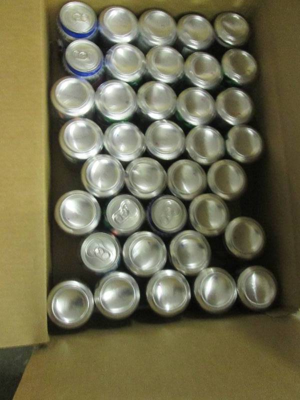 lot 120 image: 2 boxes of a mixture of pop some ca...