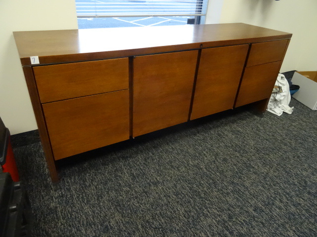 Wood credenza. 4 drawers and 2 door...