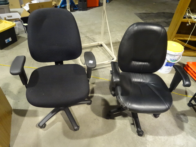 2 office chairs on wheels. ...