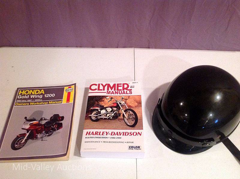 lot 76 image: Motorcycle Manuals & Helmet