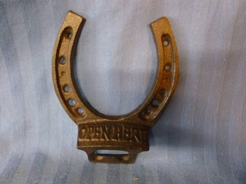 lot 55 image: Cast Iron Bottle Opener
