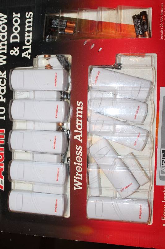 lot 36 image: Opened Box of Entry Alarm Window and Door Alarms
