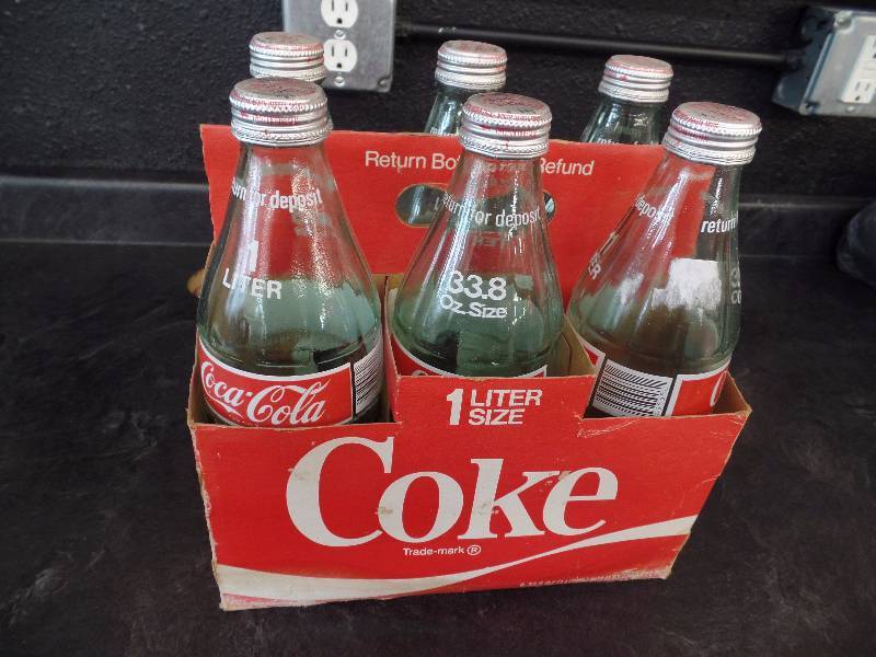 lot 12 image: Antique Coke bottle