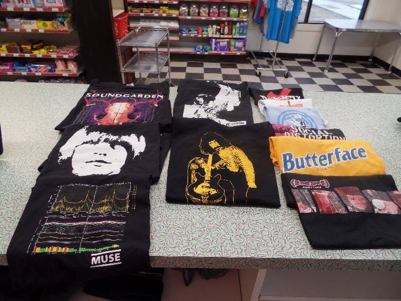 lot 21 image: Large & small  Band T-shirts
