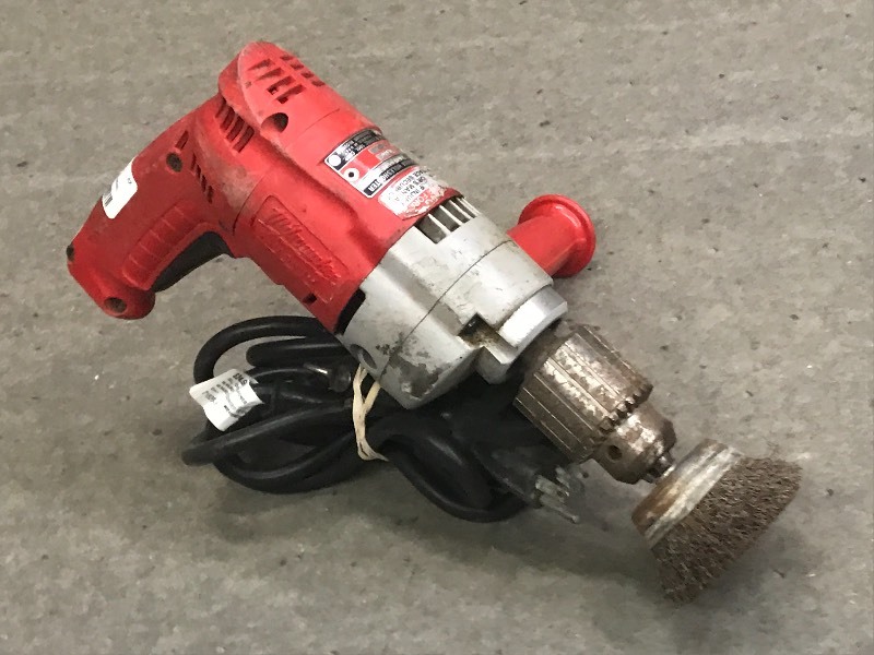 lot 46 image: Milwaukee Magunum 115Volt 12 Rev...