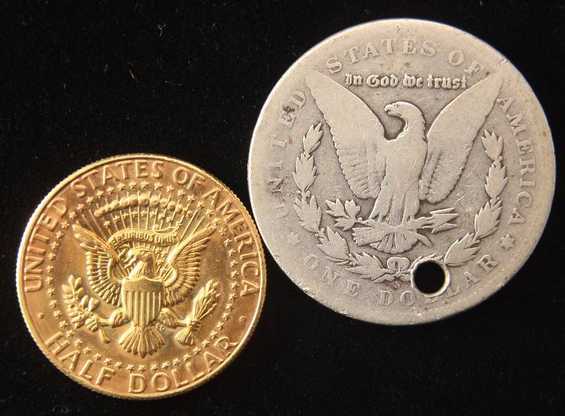 1899-S MORGAN SILVER DOLLAR (HOLED) & 1986-D GOLD PLATED HALF DOLLAR