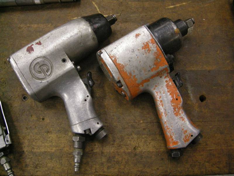 lot 66 image: Two 12 Air Impact Wrenches