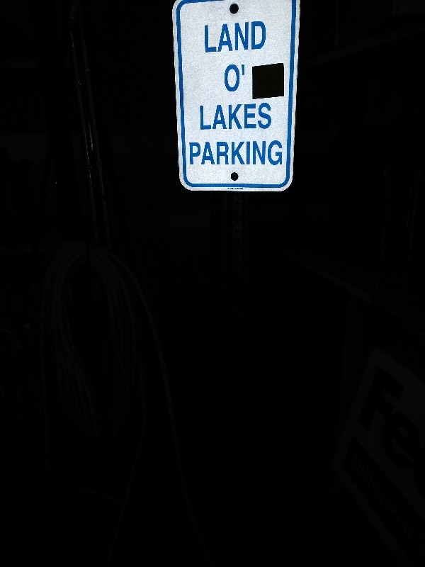 lot 75 image: Land O Lakes Parking Sign