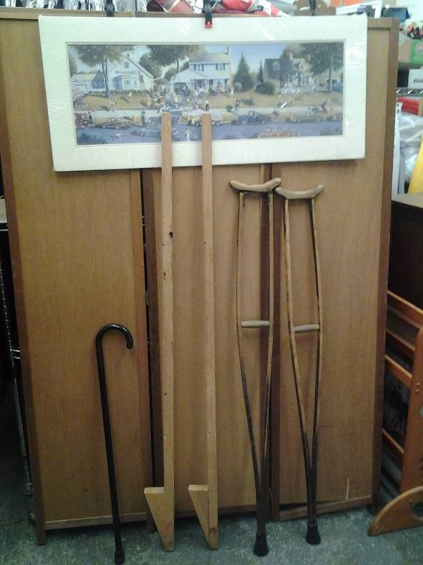 lot 42 image: 40x18 Garage Sale Print By Jos. Wallace Baker. Also Stilts, Crutches, Cane