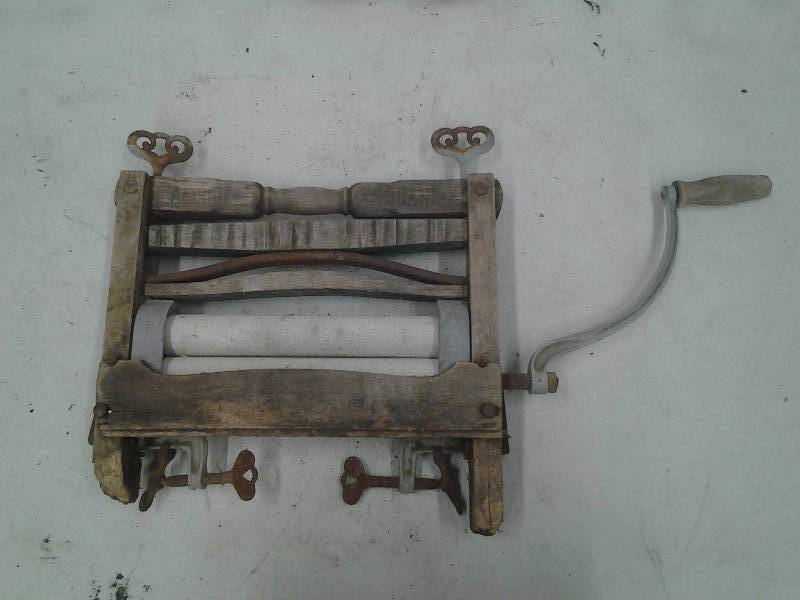 lot 60 image: Old Wringer Washer Part