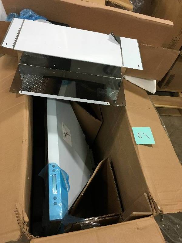 lot 6 image: Arietta Vento 30 in. Wall Mounted Decorative Chimney Range Hood in Stainless Steel - Open Box- cover with protective film- film lifted on a corner for picture