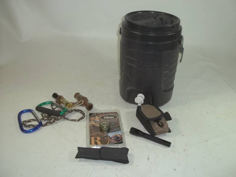 lot 75 image: Igloo cooler, duck calls and Flashlight,