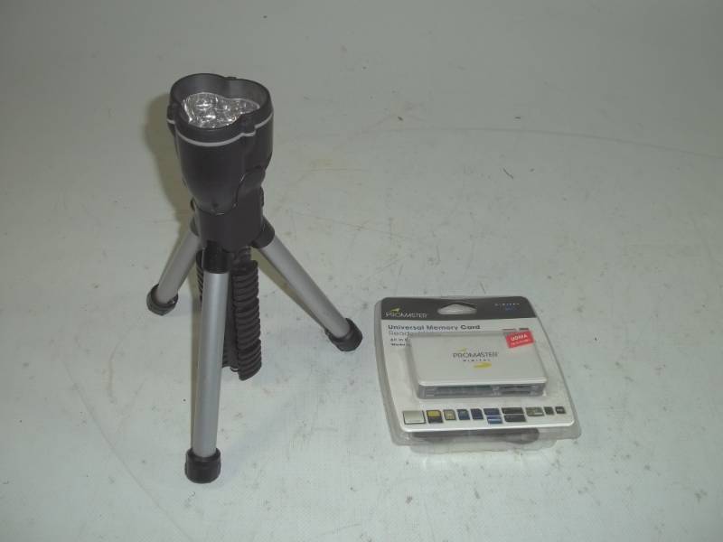 lot 76 image: Flashlight and memory card reader