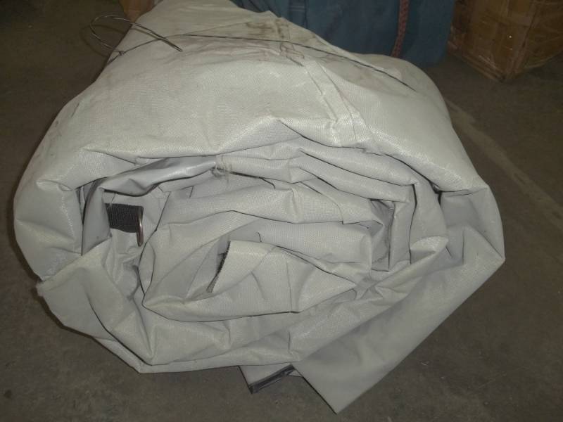 lot 122 image: Gray Wood Pile tarp may have some cuts or holes