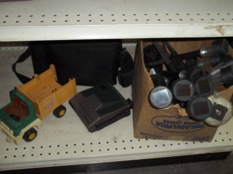 lot 150 image: Landscape lights, Polaroid Camera and toy truck
