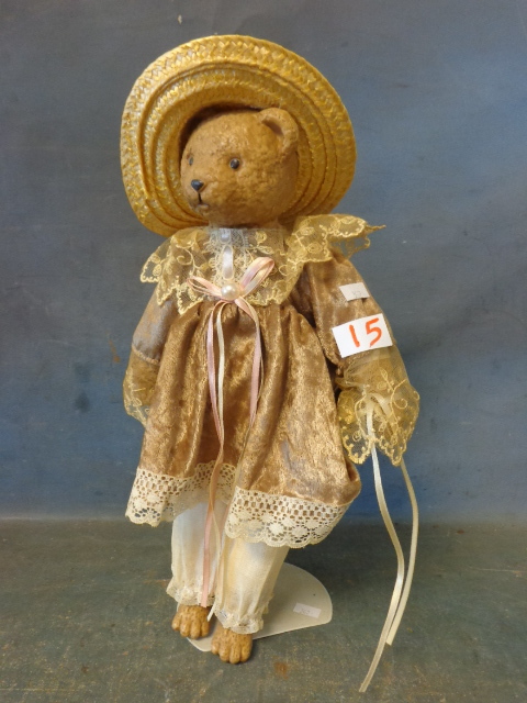 lot 15 image: Ceramic Bear Doll