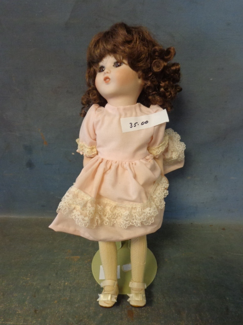 lot 16 image: Porcelain Doll