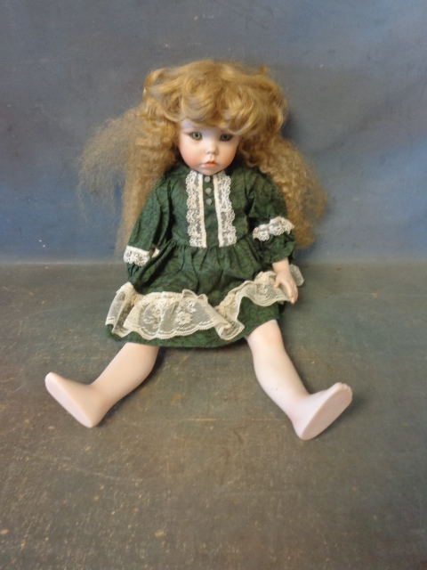 lot 25 image: Porcelain Doll