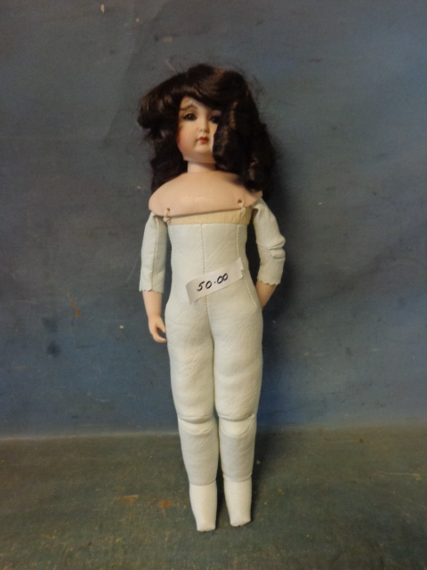 lot 28 image: Porcelain Doll