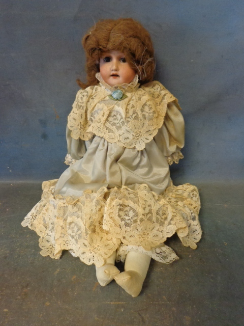 lot 29 image: Porcelain Doll