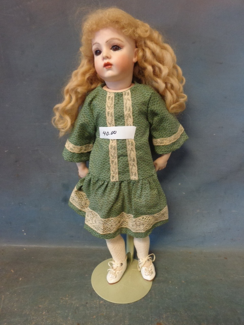 lot 32 image: Porcelain Doll